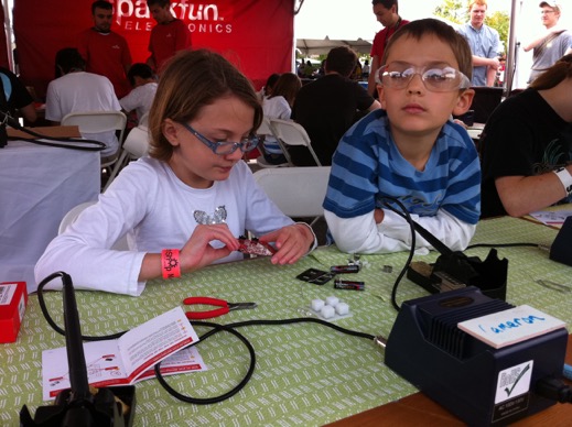 Cameron soldering the SparkFun Simon kit